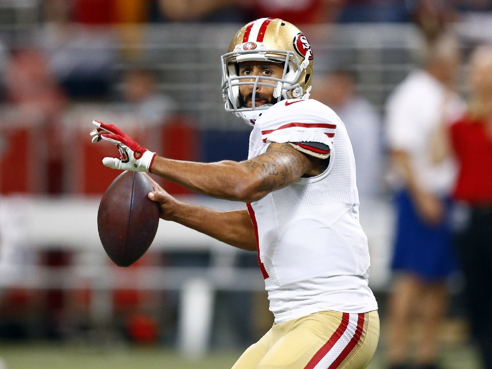 49ers quarterback Colin Kaepernick warms up before the start of an NFL football game between the St. Louis Rams and the San Francisco 49ers Sunday Nov. 1 2015 in St. Louis