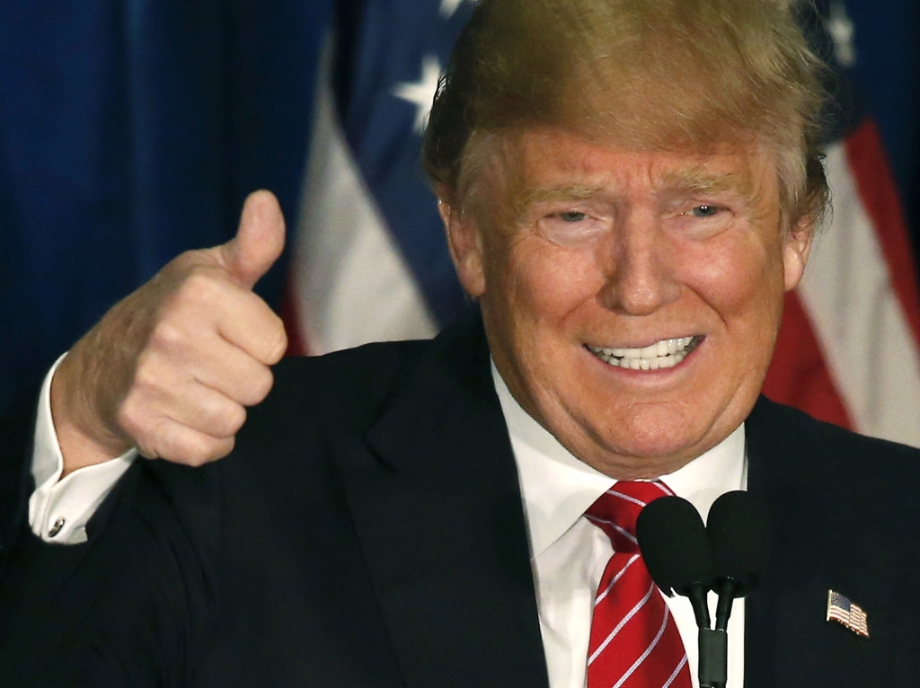 Republican presidential candidate Donald Trump gives a thumbs-up as he speaks at campaign stop Thursday