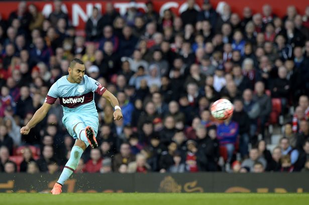 Dimitri Payet scores directly from a free kick during FA Cup Sixth Round match between Manchester United and West Ham United at Old Trafford