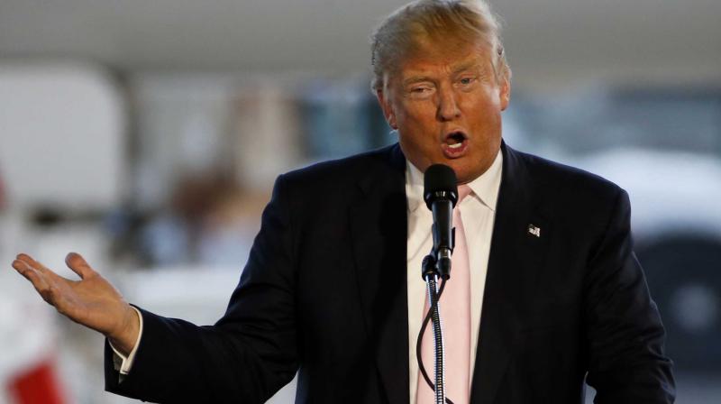 Donald Trump holds a plane-side rally in a hanger at Youngstown Warren Regional Airport in Vienna