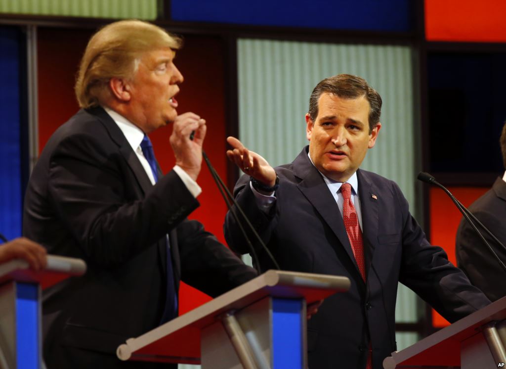 Republican presidential candidates businessman Donald Trump and Sen. Ted Cruz R-Texas argue a point during a Republican presidential primary debate at Fox Theatre Thursday