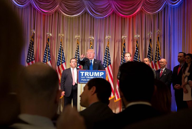 Donald Trump meets the press in Palm Beach on Tuesday night as New Jersey Gov. Chris Christie looks