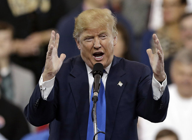 Republican presidential candidate Donald Trump speaks at a campaign rally at the I-X Center Saturday