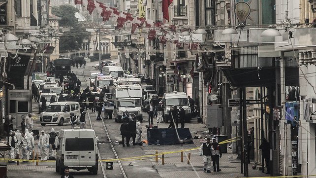 Emergency services inspecting the area following an attack in a major shopping district in Istanbul Turkey