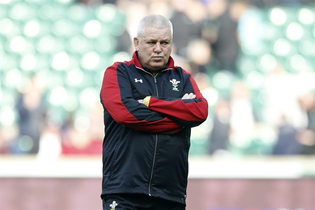 Wales’ Head Coach Warren Gatland watches the warmup before the Six Nations international rugby match between England and Wales at Twickenham stadium in London Saturday March,12 2016