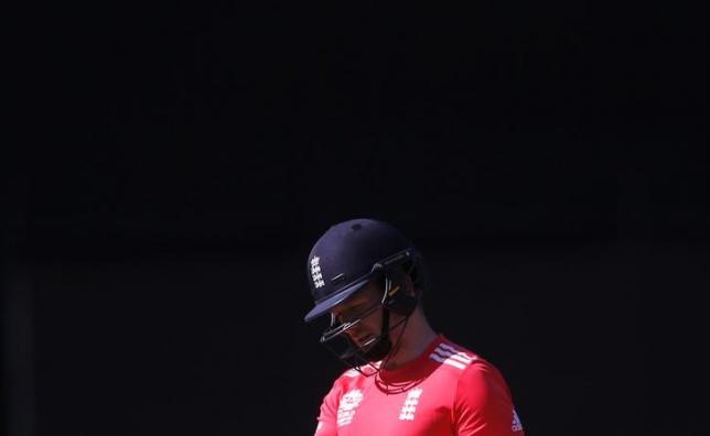 Cricket- England v Afghanistan- World Twenty20 cricket tournament- New Delhi India 23/03/2016. England's captain Eoin Morgan walks off the field after his dismissal. REUTERS  Adnan Abidi