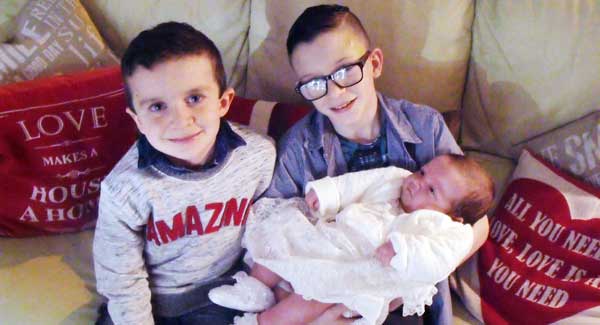 Evan and Mark with their little sister Rionaghac-Ann