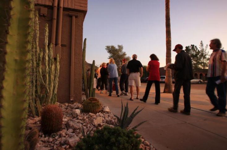 Phoenix official backtracks after blaming voters for lines