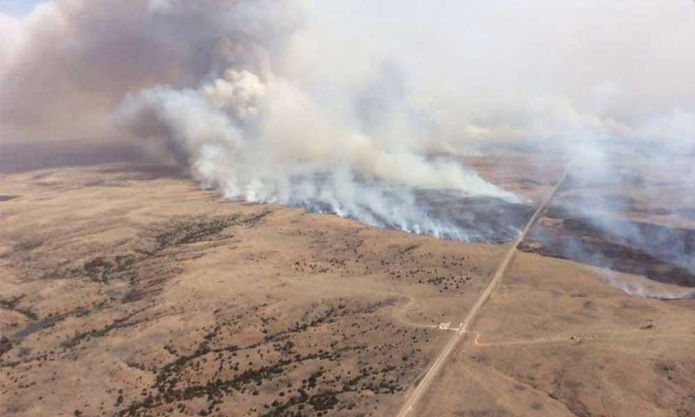 Fire located 15 miles west of Alva Oklahoma and extended into Kansas