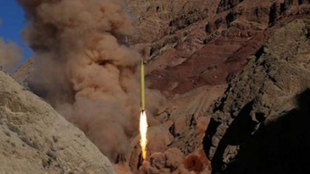 Iranian Fars News Agency a Qadr H long-range ballistic surface-to-surface missile is fired by Iran's powerful Revolutionary Guard during a maneuver in an undisclosed location in Iran Wednesday