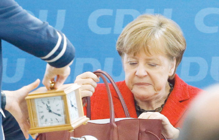 German Chancellor and leader of the Christian Democratic Union Angela Merkel attends a party board meeting in Berlin Germany on Monday. — Reuters