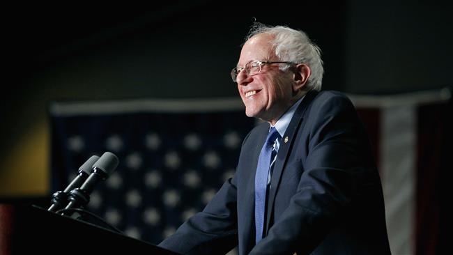 US Democratic presidential candidate Bernie Sanders speaks to a crowd gathered at the Phoenix Convention Center during a campaign rally