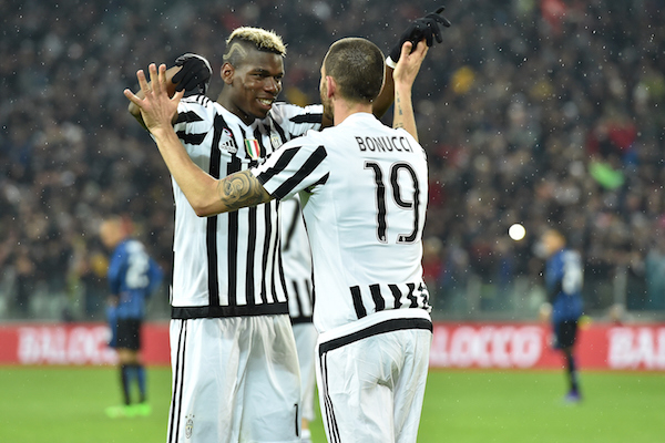 TURIN ITALY- FEBRUARY 28 Leonardo Bonucci of Juventus FC celebrates the opening goal with team mate Paul Pogba during the Serie A match between Juventus FC and FC Internazionale Milano at Juventus Arena