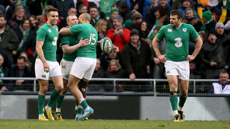 Ireland's Keith Earls celebrates scoring their second try with team-mates Johnny Sexton and Simon Zebo