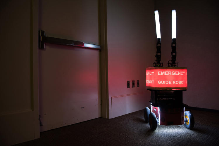 Foolish humans blindly follow robot guides into danger