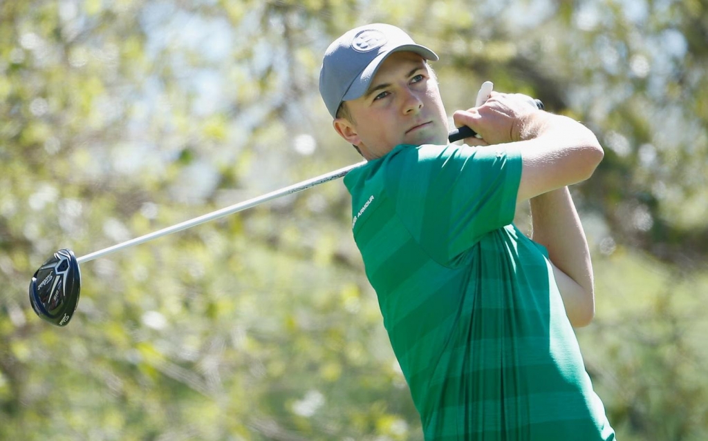 Jordan Spieth hits his tee shot on the 12th hole during the second round of the World Golf Championships on Thursday