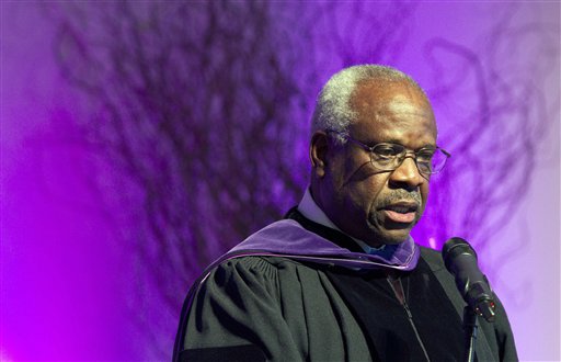 Supreme Court Justice Clarence Thomas speaks at College of the Holy Cross in Worcester Mass. Thomas has asked questions during Supreme Court arguments for the first time in 10