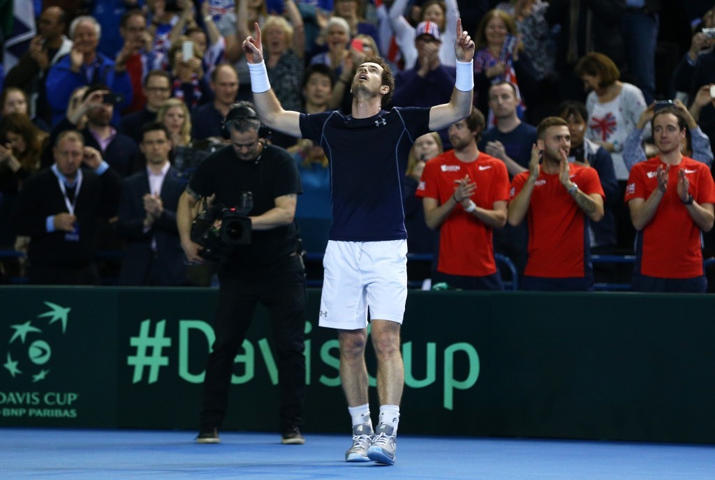 Andy Murray beat Japan’s Kei Nishikori to secure victory for defending champions Great Britain in the first round of the Davis Cup