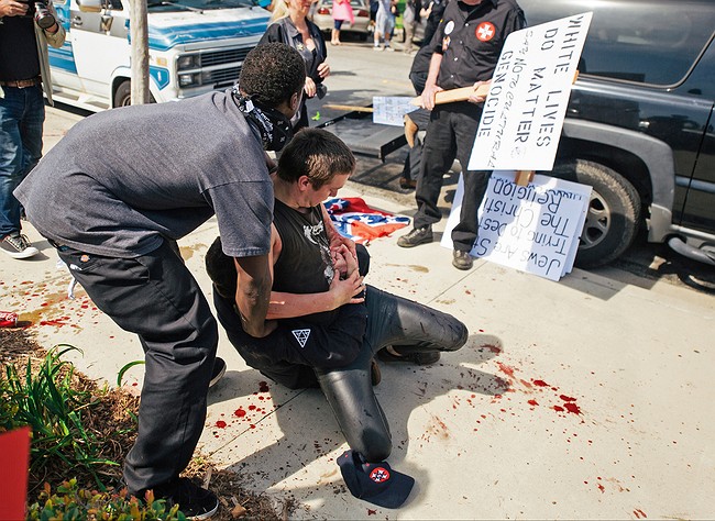 Police: KKK members acted in self-defense when they stabbed 3 counter-protesters at meager rally