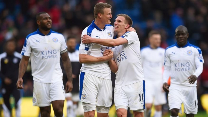 LONDON ENGLAND- MARCH 19 Marc Albrighton and Robert Huth of Leicester City celebrate their 1-0 win in the Barclays Premier League match between Crystal Palace and Leicester City at Selhurst Park