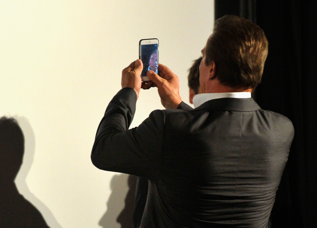 Actor Arnold Schwarzenegger grabs a selfie during the 'Maggie&#039 Premiere and Golden Icon Award Ceremony in Zurich