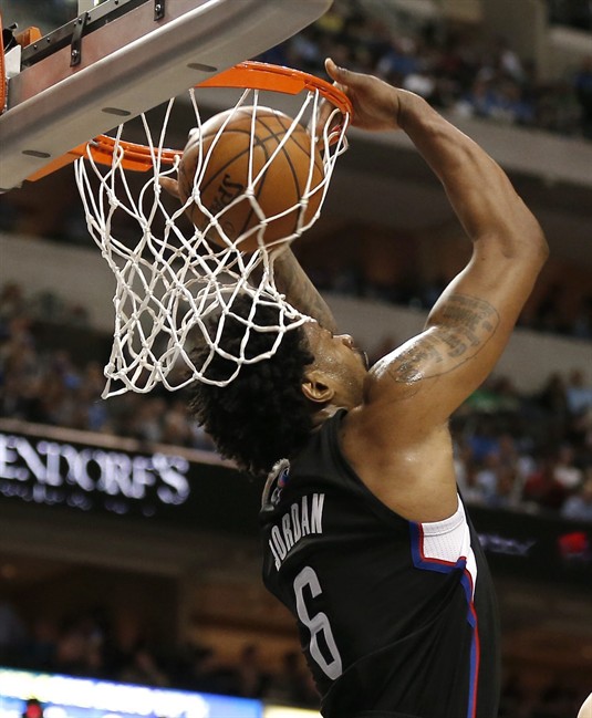 Los Angeles Clippers forward De Andre Jordan dunks during the first half of an NBA basketball game against the Dallas Mavericks Monday