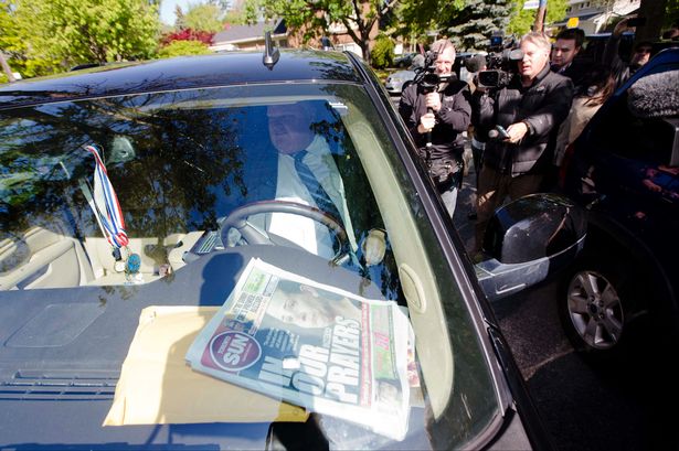 Toronto Mayor Ford comes under media scrutiny as he leaves his home