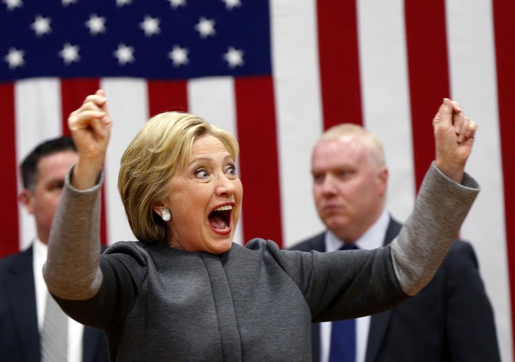 Democratic presidential candidate Hillary Clinton acknowledges the crowd as she arrives to speak at a'Get Out The Vote campaign rally in Norfolk Va. Monday Feb. 29 2016