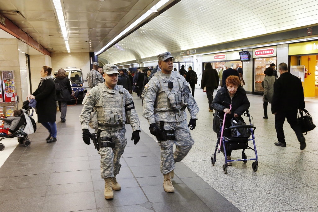 Members of the New York National Guard patrol Penn Station Tuesday