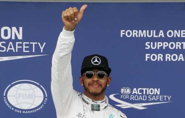 Mercedes F1 driver Lewis Hamilton gives a thumbs up after qualifying at the Australian Formula One Grand Prix in Melbourne