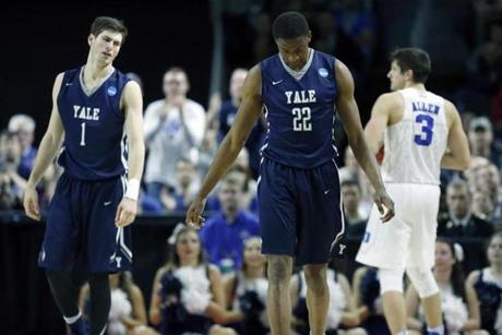 Yale's Justin Sears and Anthony Dallier react in front of Duke's Grayson Allen after a turnover during the second half in the second round of the NCAA men's college basketball tournament in Providence R.I. Saturday March 19