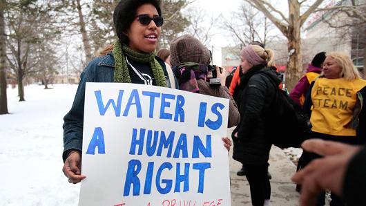 Demonstrators protest over the Flint Michigan contaminated water crisis