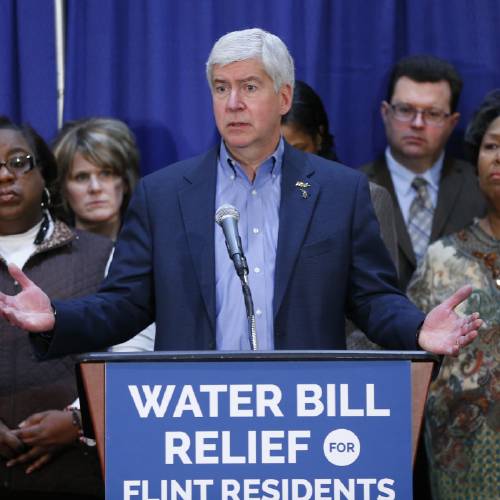 Gov. Rick Snyder speaks after attending a Flint Water Interagency Coordinating Committee meeting in Flint Mich. The state of Michigan restricted Flint from switching water sources last April unless it got approval fro