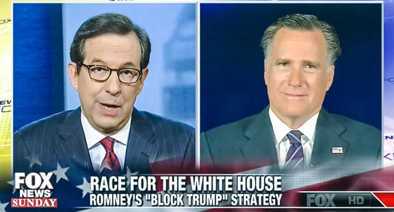 Mitt Romney speaks to Fox News host Chris Wallace