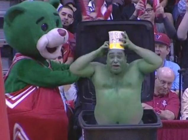 The Houston Rockets mascot tried to distract a free throw shooter with a green man popping out of a garbage can at last night's game