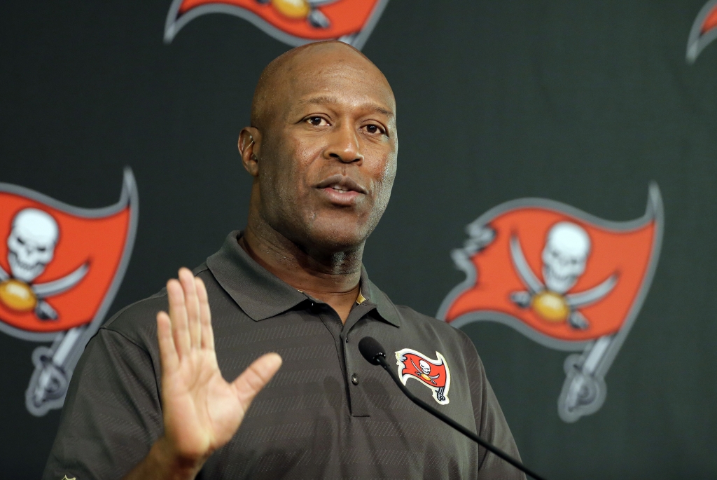 Tampa Bay Buccaneers head coach Lovie Smith speaks at a news conference in Tampa Fla. The University of Illinois said Monday