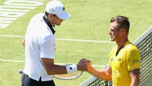 John Isner has won the battle of big serves against Australia’s Sam Groth to give the United States a 1-0 lead on day one of the Davis Cup clash at Kooyong