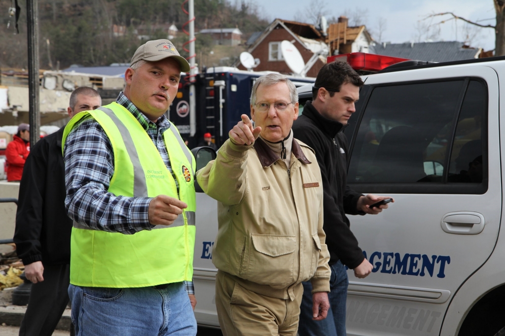 Sen Mitch McConnell with The Incident Commander Tim Conley County Judge Executive tours tornado devastated West Liberty Kentucky on Sunday