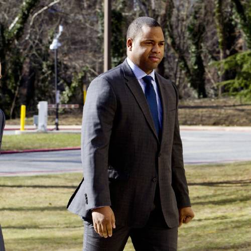 Officer William Porter right one of six Baltimore city police officers charged in the death of Freddie Gray arrives to Maryland Court of Appeals in Annapolis Md. Maryland's highest court has ruled