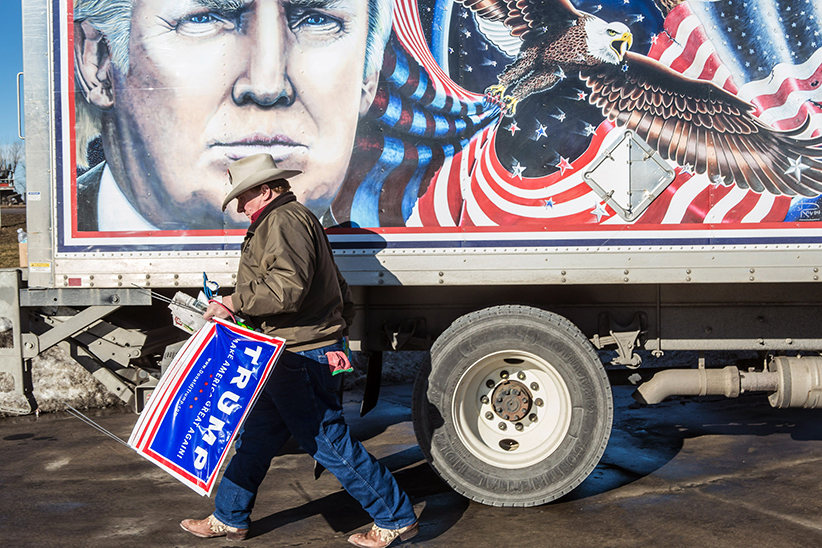 DES MOINES IA- JANUARY 28 Kraig Moss a supporter of Republican presidential candidate Donald Trump outside a truck with a Trump painting in which he is touring Iowa