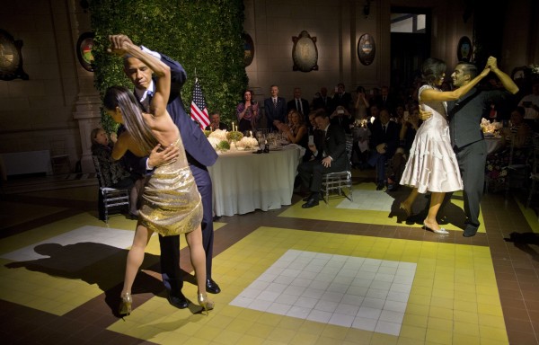 President Barack Obama and first lady Michelle Obama right dance the tango with tango dancers