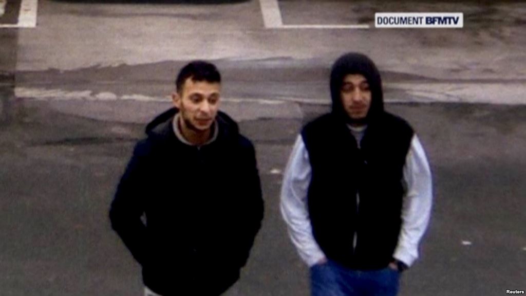 Paris shooting suspect Salah Abdeslam and suspected accomplice Hamza Attou are seen at a filling station on a highway between Paris and Brussels in Trith-Saint-Leger France in this still image taken from