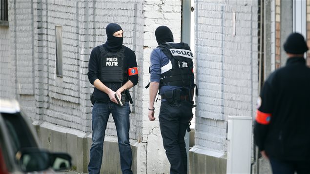 Brussels terror raid: police officers injured