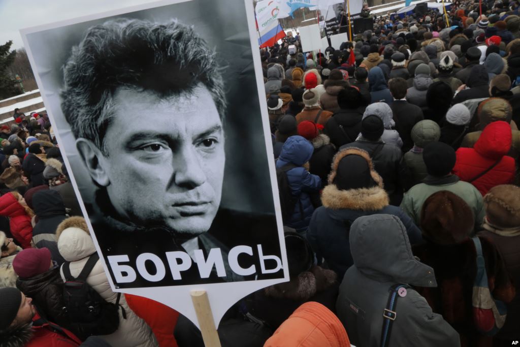 People gather in St. Petersburg Russia to commemorate the 2015 slaying of opposition leader Boris Nemtsov Feb. 27 2016