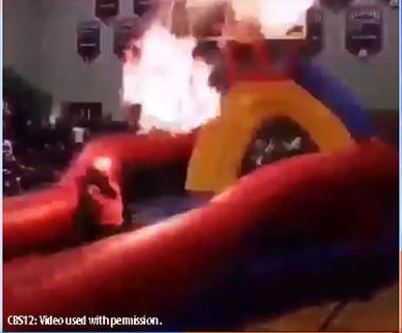 Performer at school pep rally catches fire