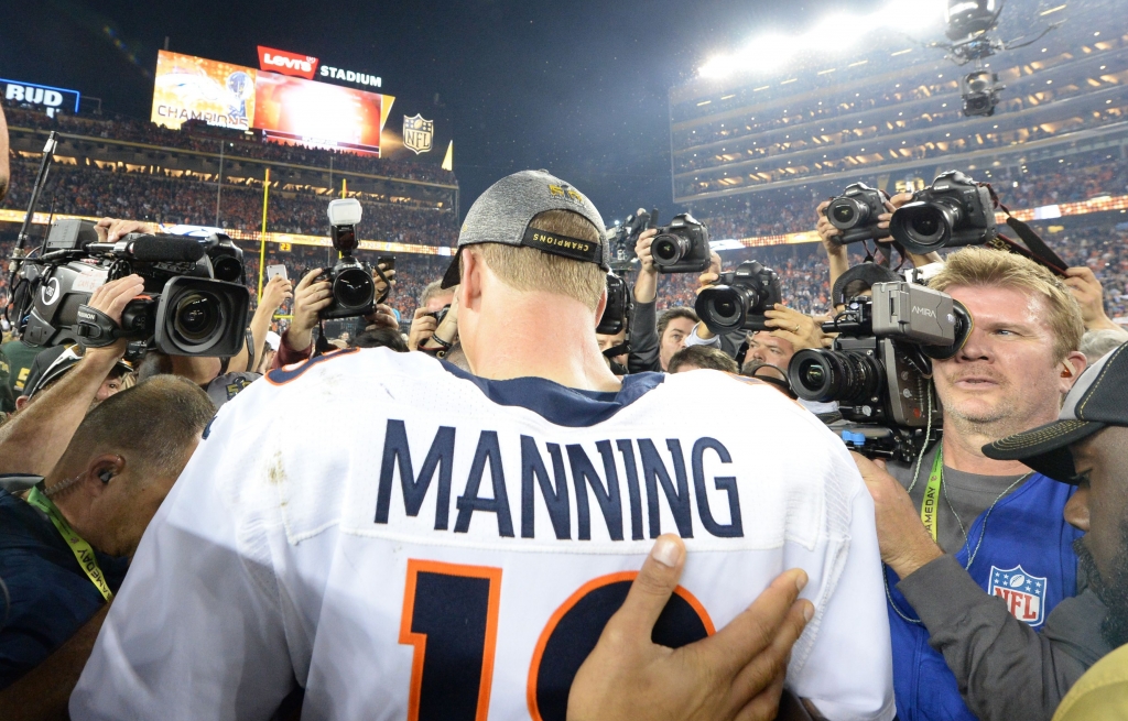 Quarterback Petyton Manning of the Denver Broncos is surrounded by the media following victory over the Carolina Panthers in Super Bowl 50 at Levi's Stadium in Santa Clara California