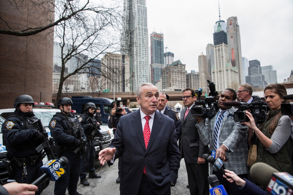 Police Commissioner Bill Bratton with NYPD officers and press