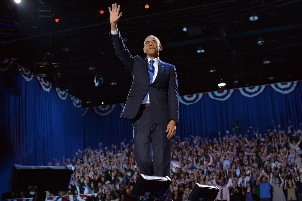 President Barack Obama waves at supporters following his victory speech on election