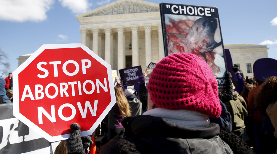 Protesters demonstrate in front of the U.S. Supreme Court in Washingt