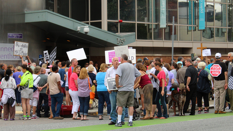 Protesters gather in August outside a Planned Parenthood clinic on Commonwealth Avenue in Boston